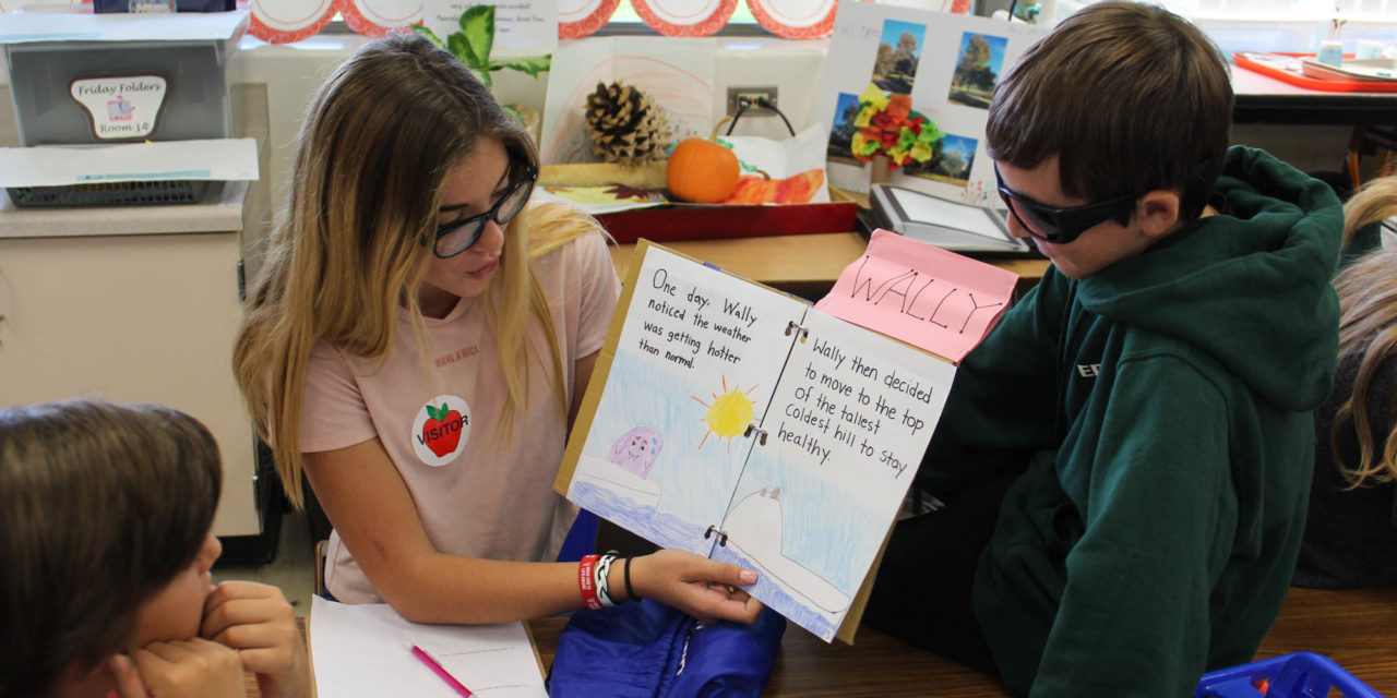PICTURES: ASE students write and illustrate books to teach local 2nd graders about the environment