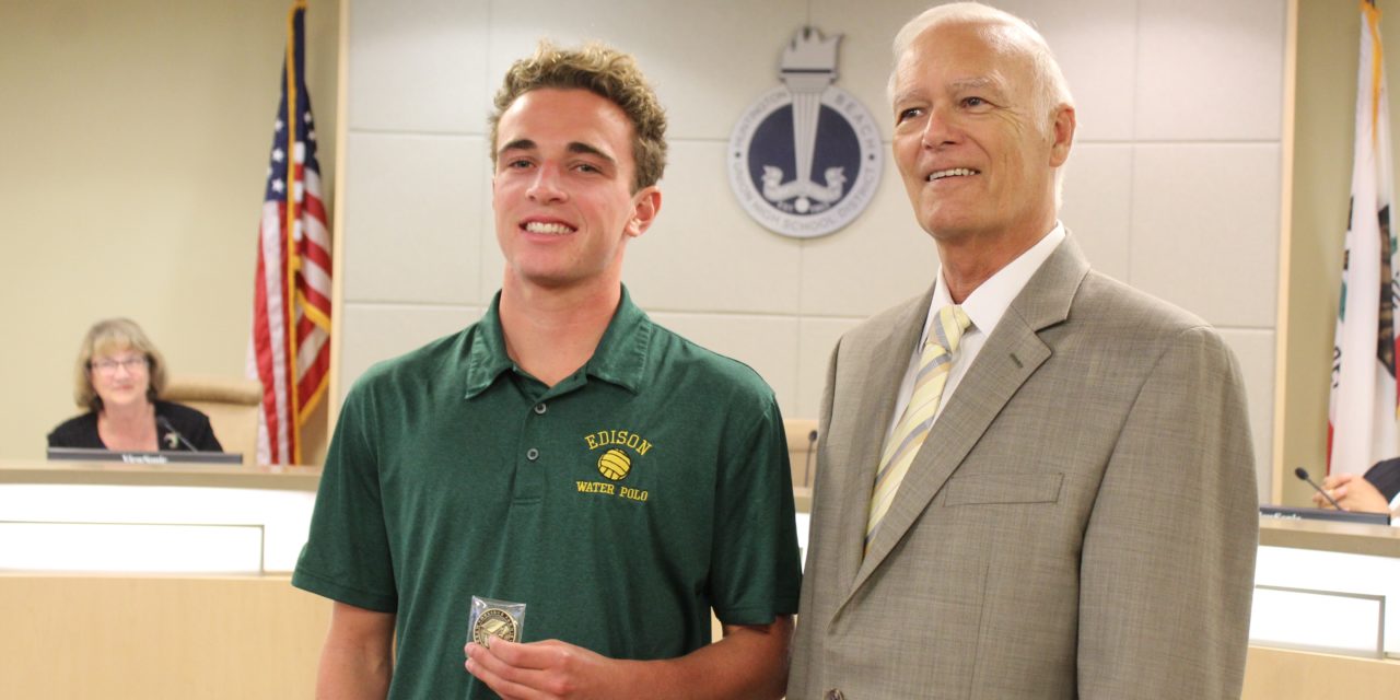 Board of Trustees honors student for his selfless swimming for school supplies