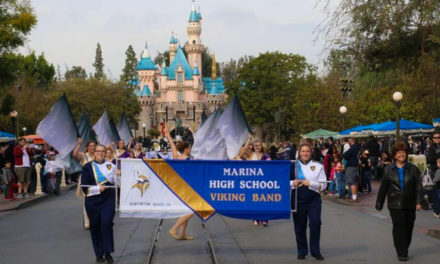 Marina’s band and color guard perform through the streets of Disneyland
