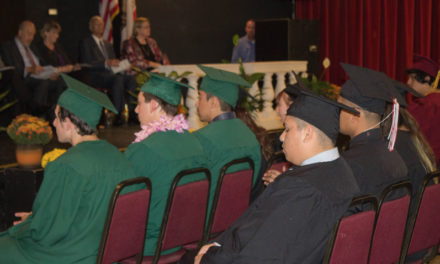 Determined students receive diplomas at fall graduation